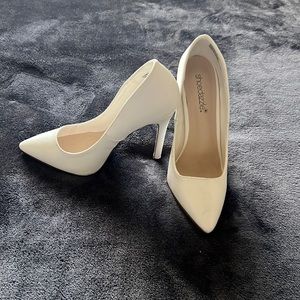 White closed toe heels
